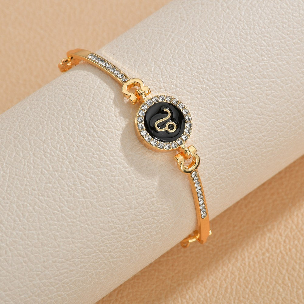 Wholesale Drip Oil 12 Constellation Gold Rhinestone Alloy Bracelet